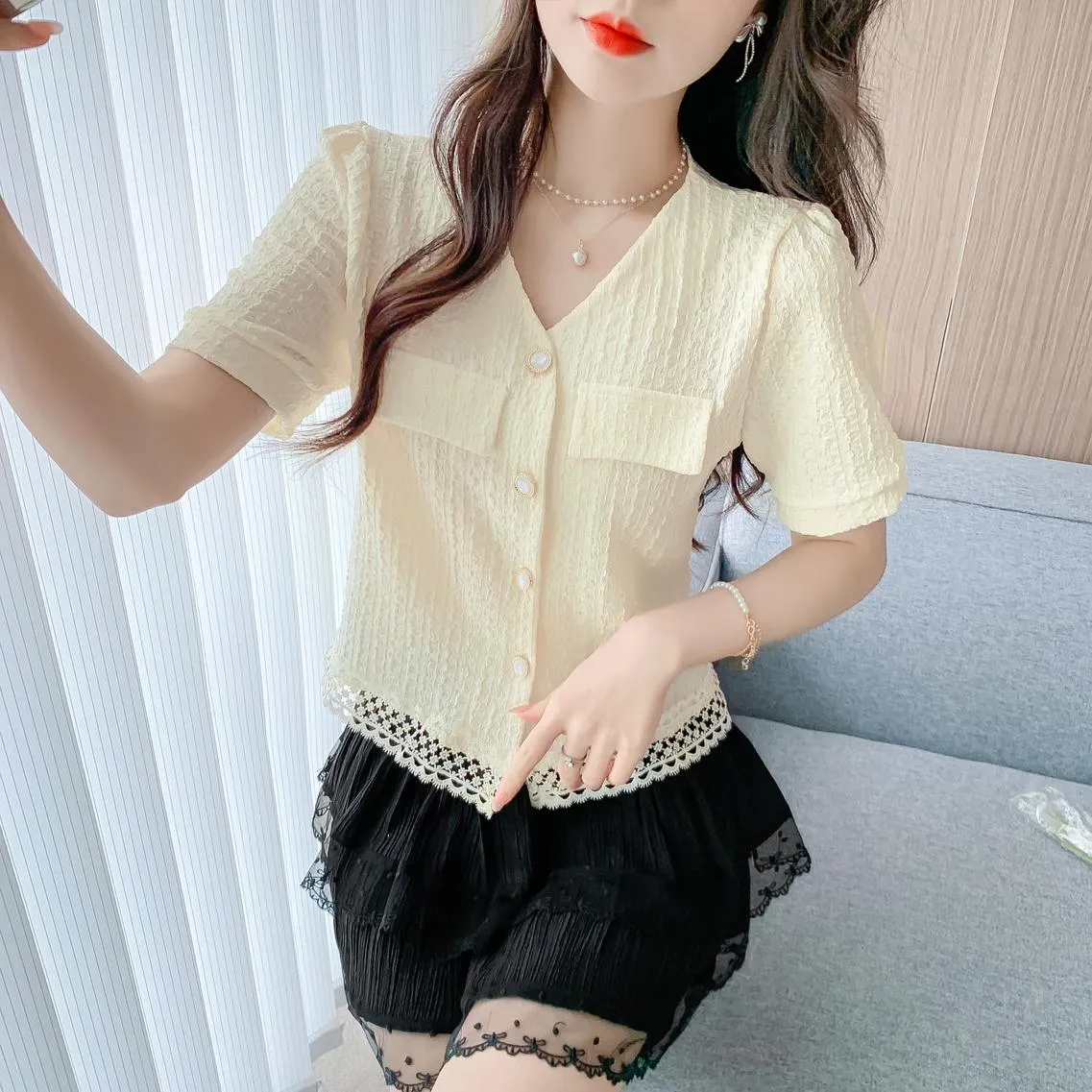 Relaxed-fit Women's Blouse Featuring Flap Pocket and Lace Trim