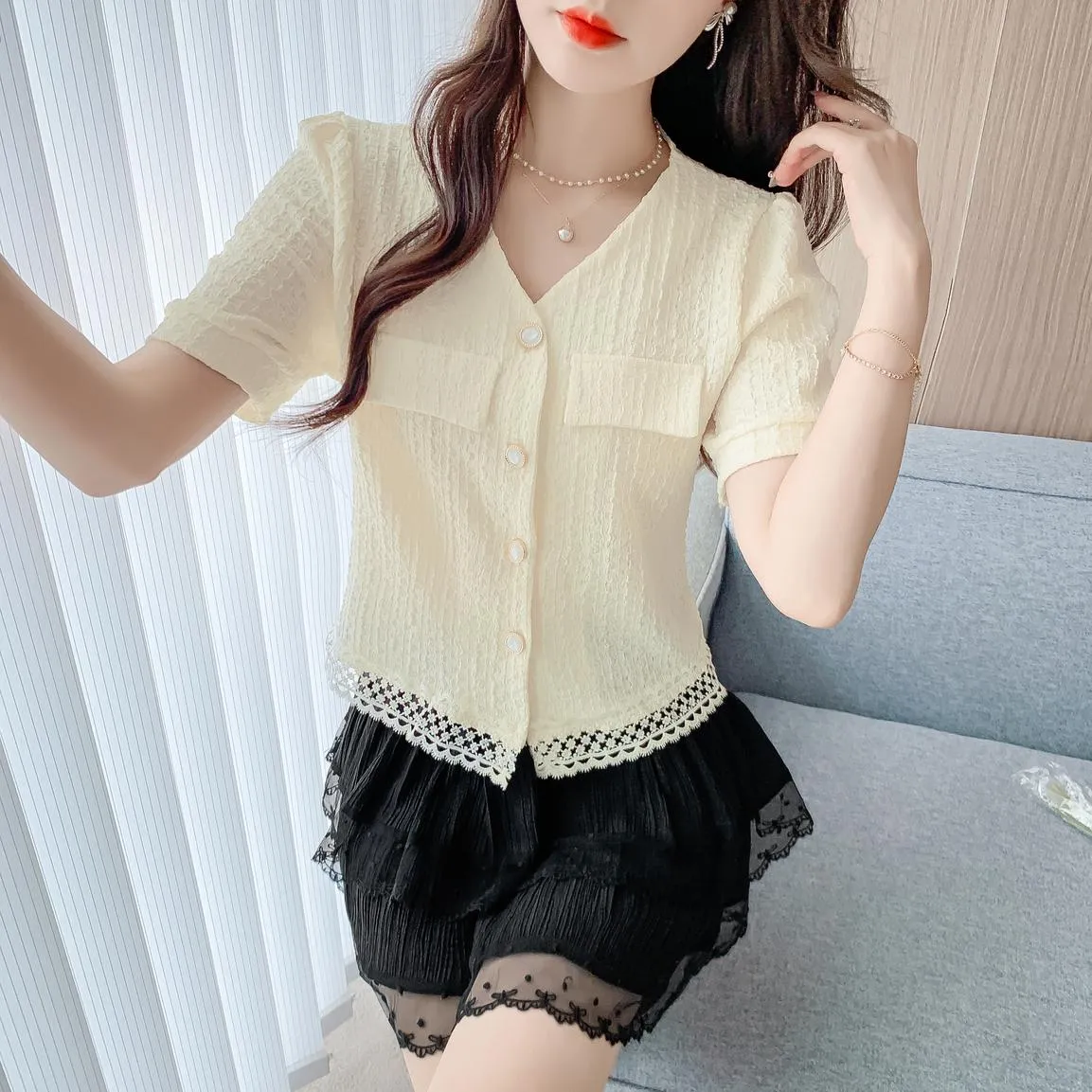 Relaxed-fit Women's Blouse Featuring Flap Pocket and Lace Trim